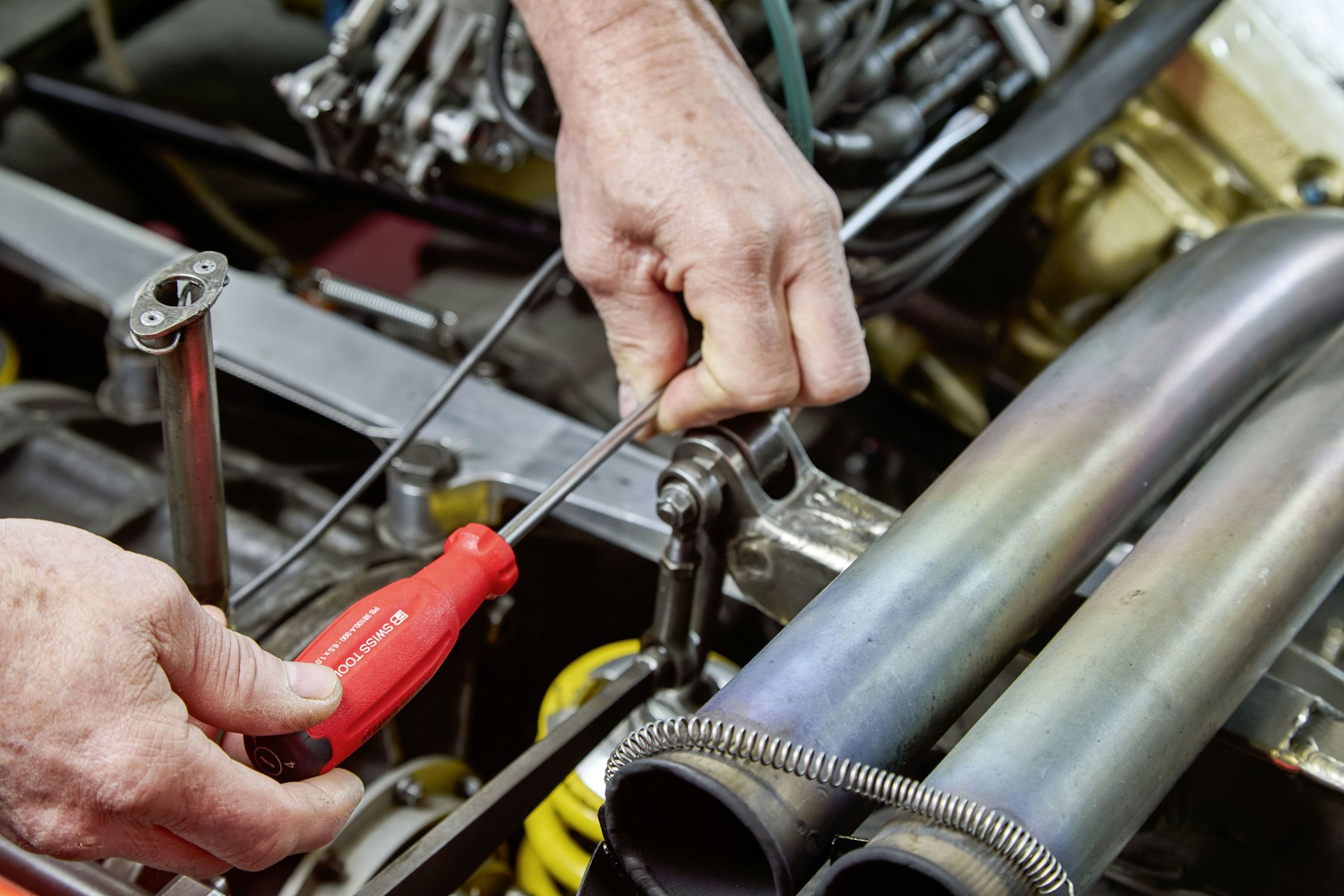 Riverbend Auto Body technicians outside the shop